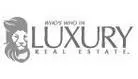 A logo of luxury real estate